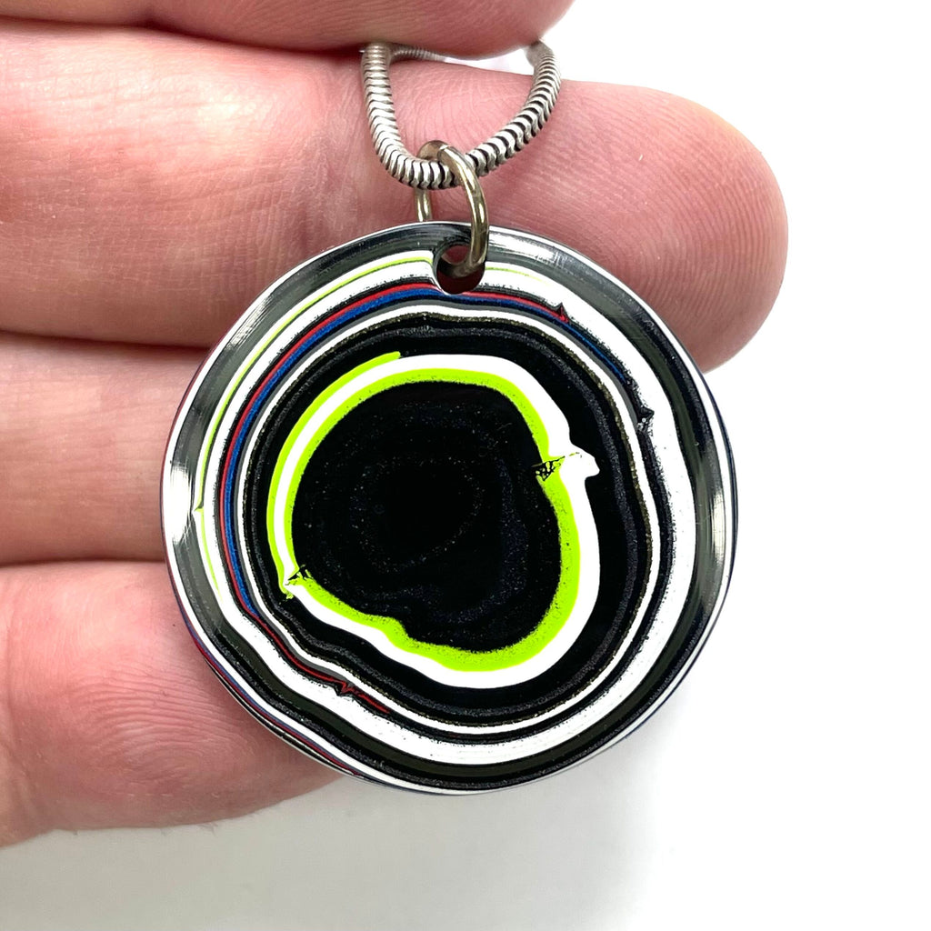 DVH JpWrnglr Fordite Round Pendant Toledo, Ohio 33mmx6 (4898)