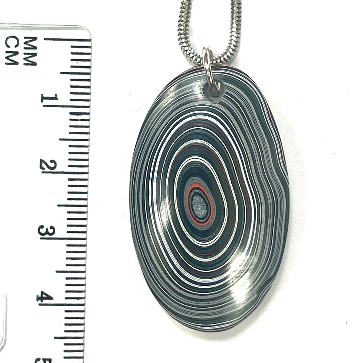DVH Goldilocks Jp Genuine Fordite Pendant Michigan 40x24x8mm (6870)