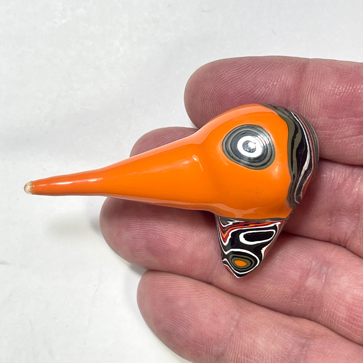 DVH Joose Orange Jp Fordite Bird Head Specimen Michigan 60x37x21mm (6909)