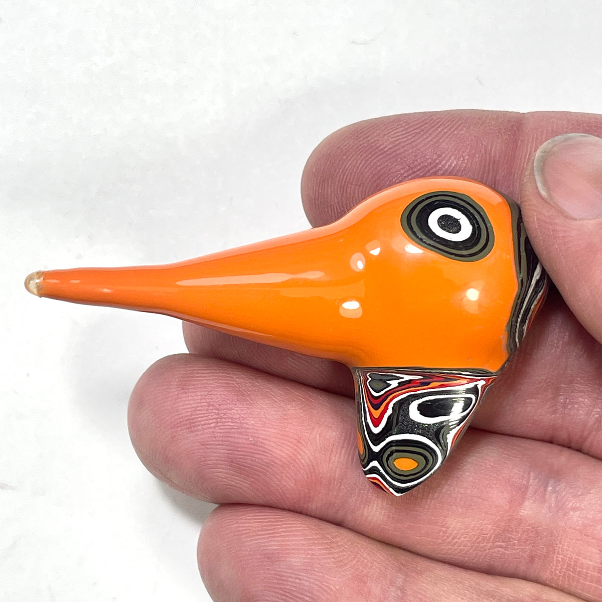 DVH Joose Orange Jp Fordite Bird Head Specimen Michigan 60x37x21mm (6909)