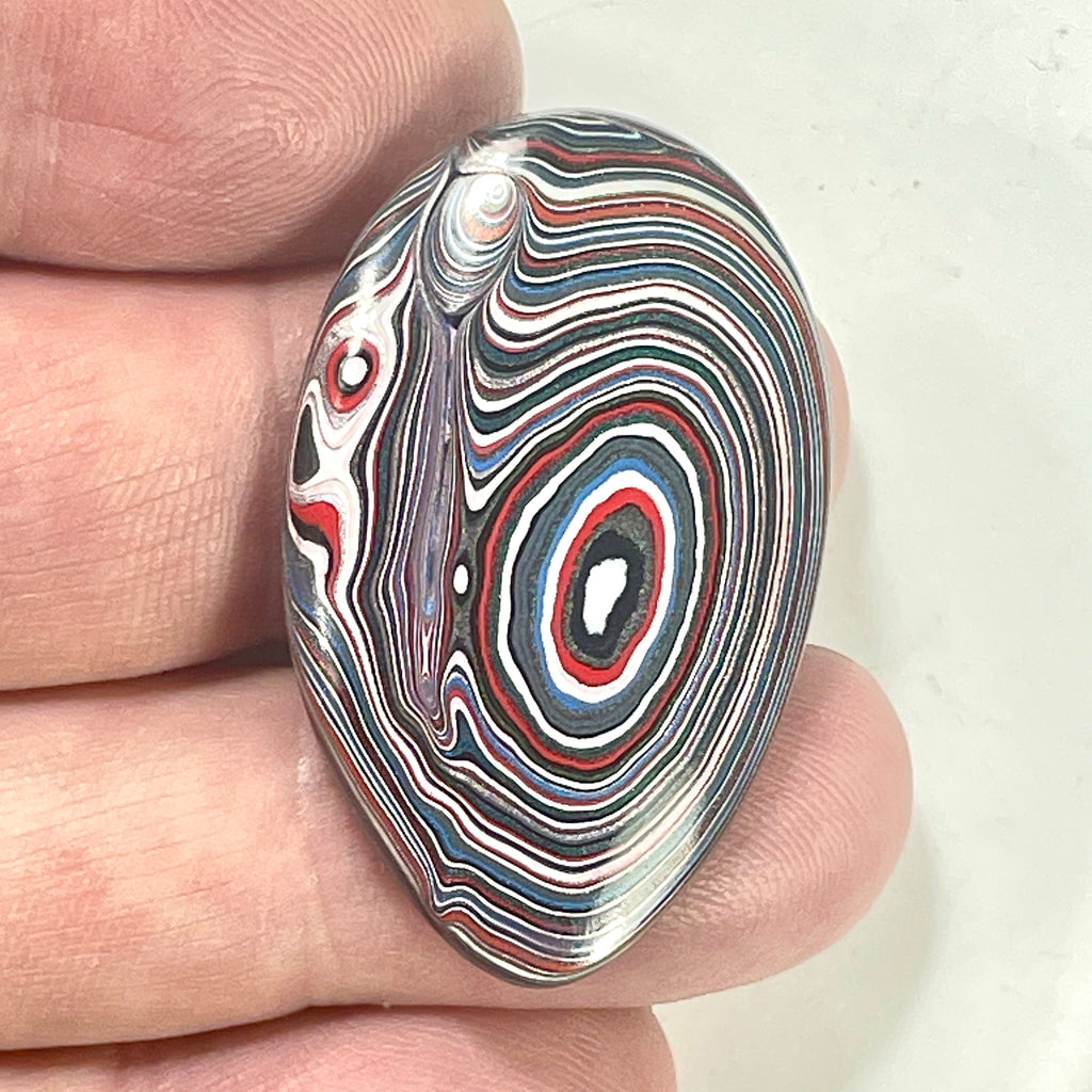 DVH Fordite Cabochon Genuine Michigan Mustang 39x25x5mm (6418)