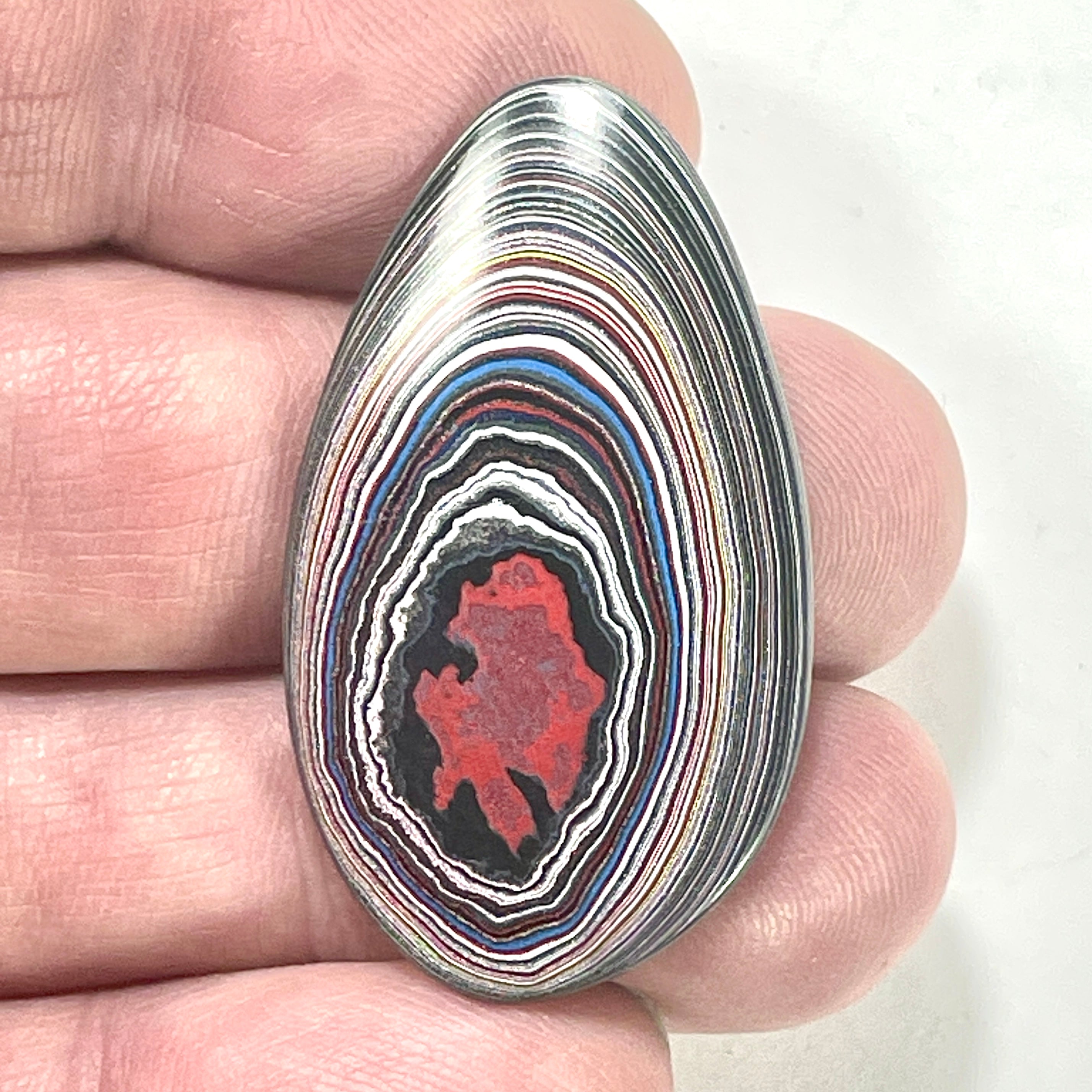 DVH Fordite Cabochon Genuine Michigan Mustang 40x23x4mm (6424)