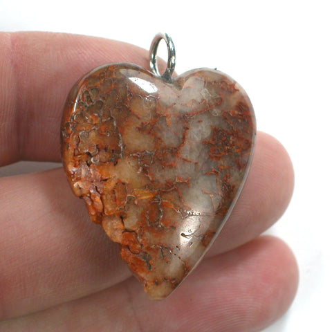 DVH Red Dinosaur Bone Broken Heart Pendant Fluorescent Fossil 35x29x10 (4282)