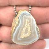 PRIVATE COLLECTION Polished Oregon Beach Agate Bead Pendant Private Collection 32x26x14 (4924)